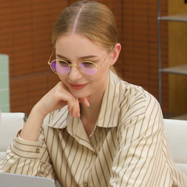 A Woman wearing ANYLUV Orion Everyday Protection's Blue Light Blocking Glasses