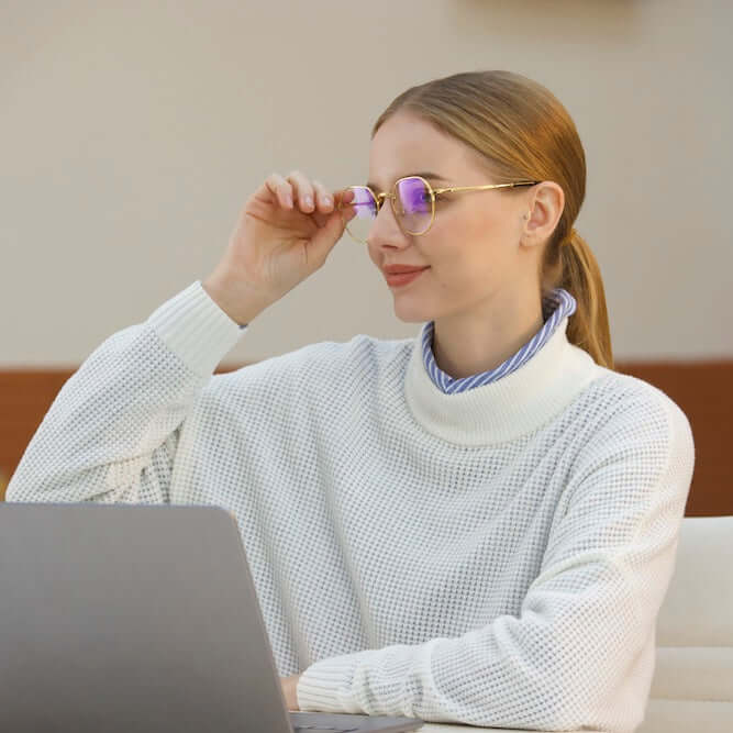 A woman wearing ANYLUV Rayne Everyday Protection's Blue Light Blocking Glasses