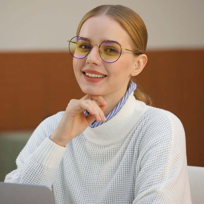 A woman wearing ANYLUV Rayne Everyday Protection's Blue Light Blocking Glasses